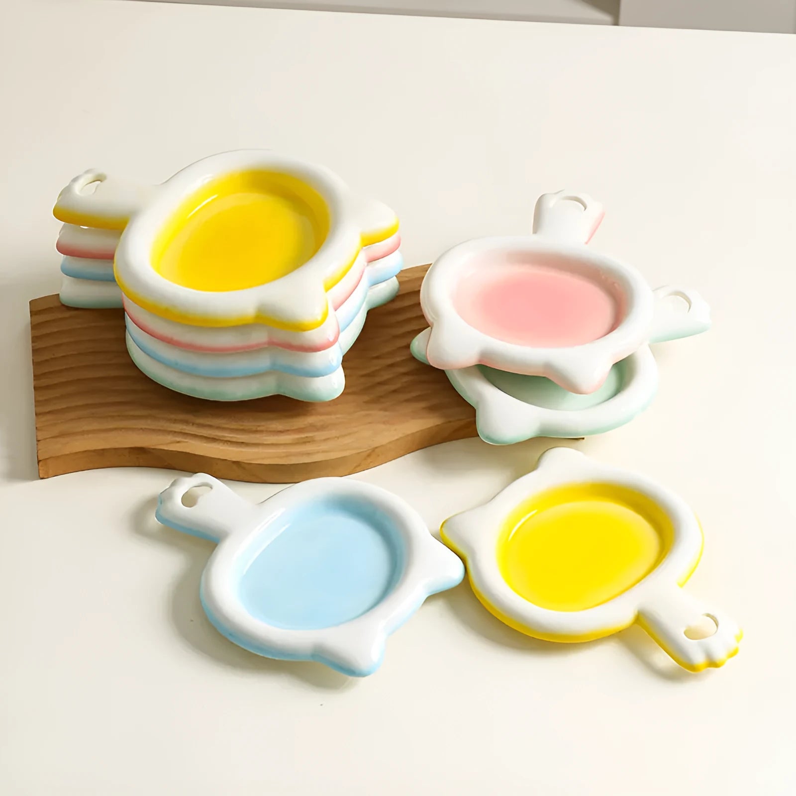 Ceramic cat food bowl with non-slip silicone base in blue, green, pink, or yellow colour options