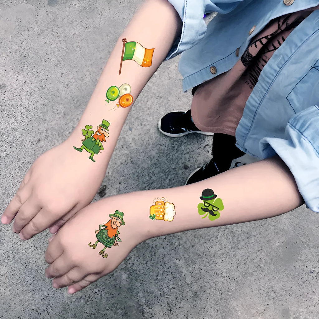 Sheet of children's temporary tattoo stickers featuring a large green St. Patrick's Day clover design