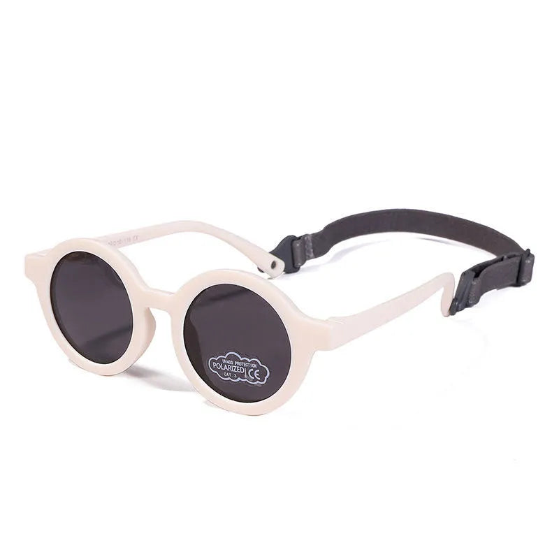 Children's silicone sunglasses for 0-3 year olds with round frame and polarized lenses in multiple colour options