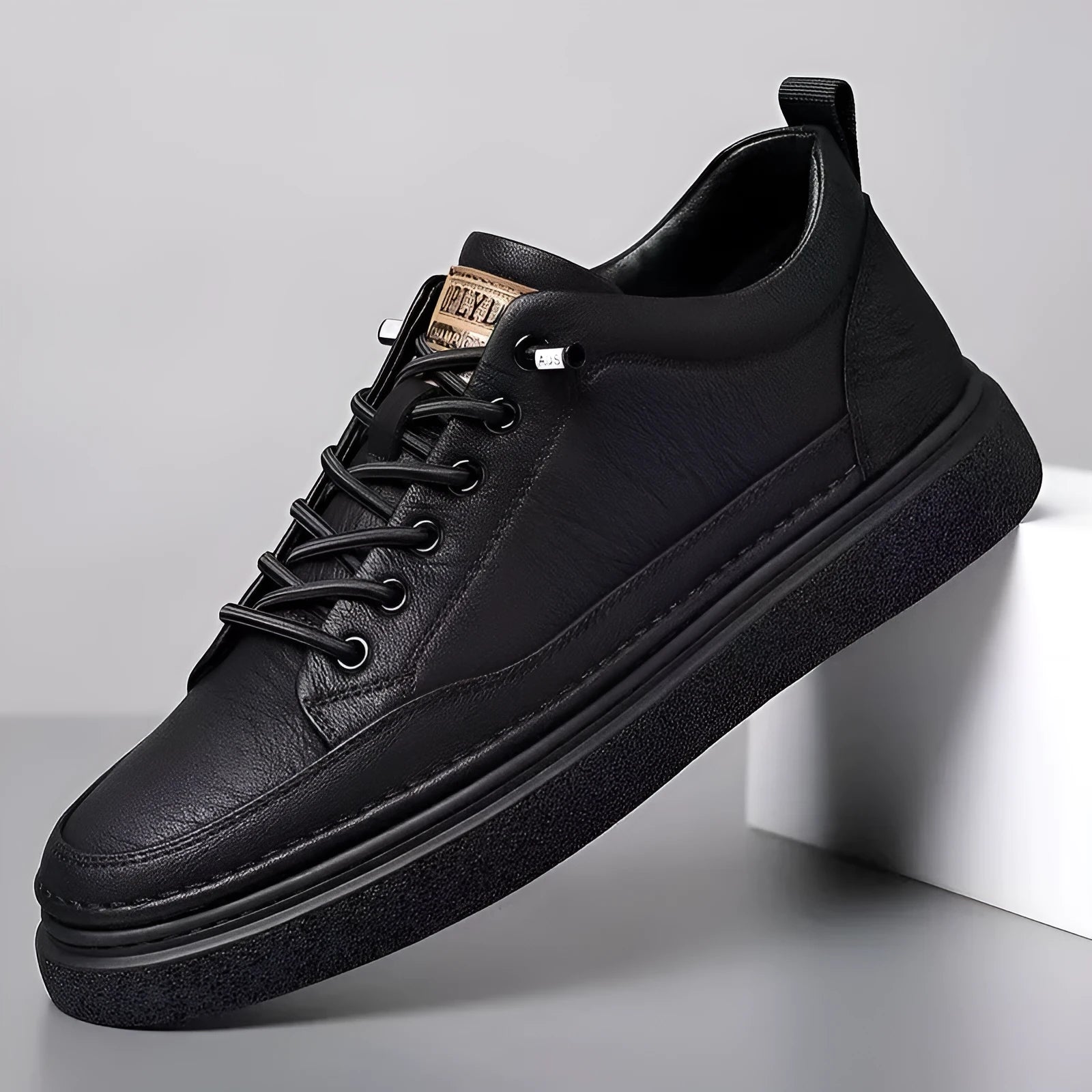 Men's black sports casual loafers with artificial PU upper and sewing line detail