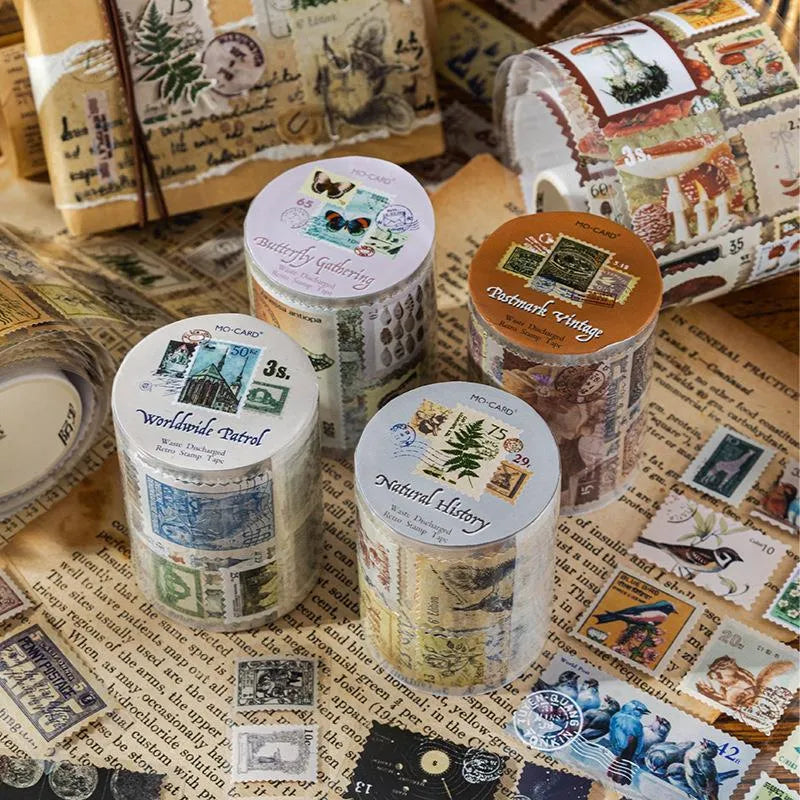 A roll of retro-patterned coated paper stamp stickers, 55mm wide, for DIY journal decoration.