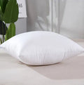 White cotton throw pillow with detachable cover in large rectangular size for sofa or bed