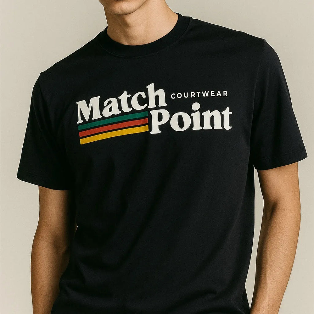 Man wearing a black t-shirt with a detailed 3D digital printed pattern on the front.