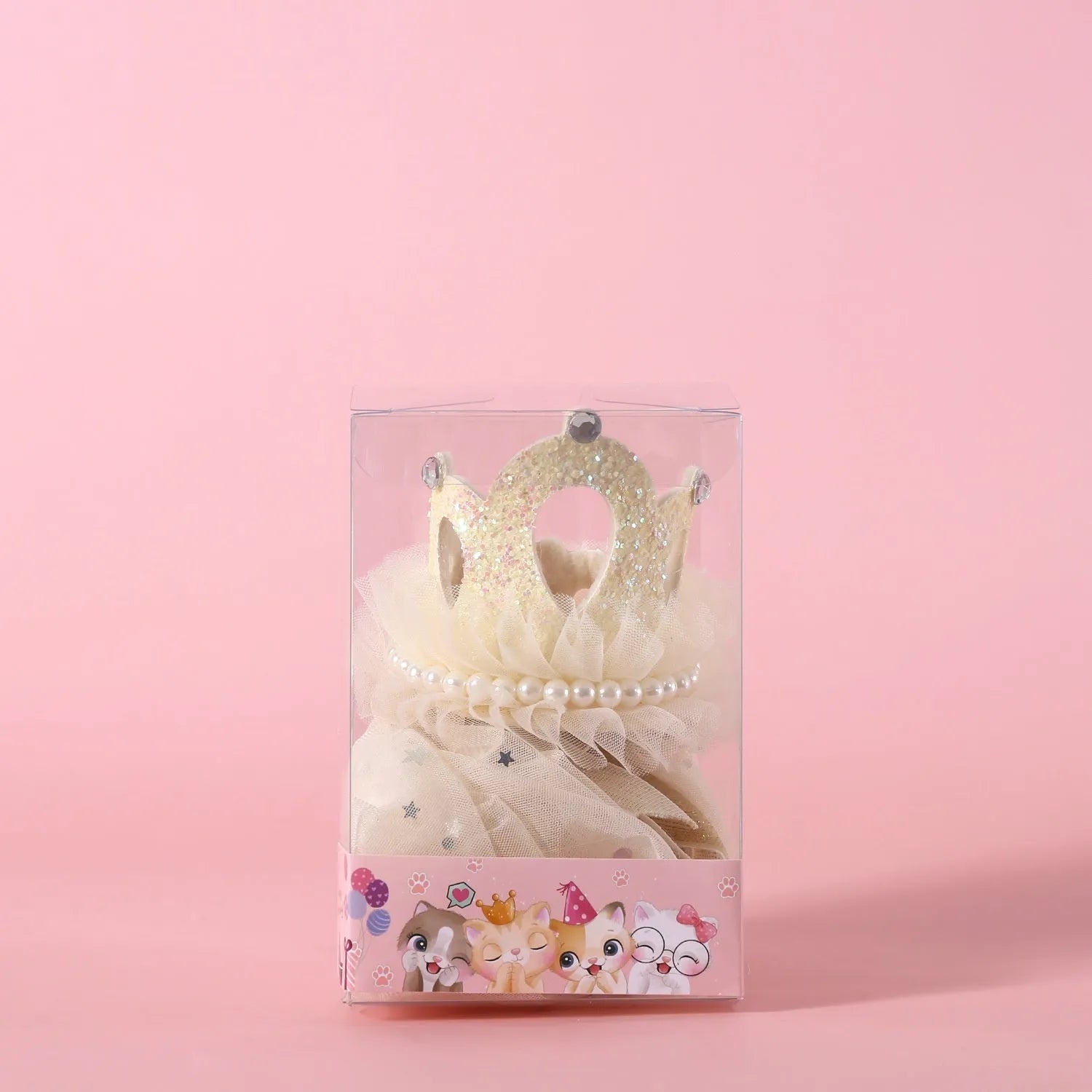 Cat wearing princess crown headdress with veil for wedding or birthday celebration
