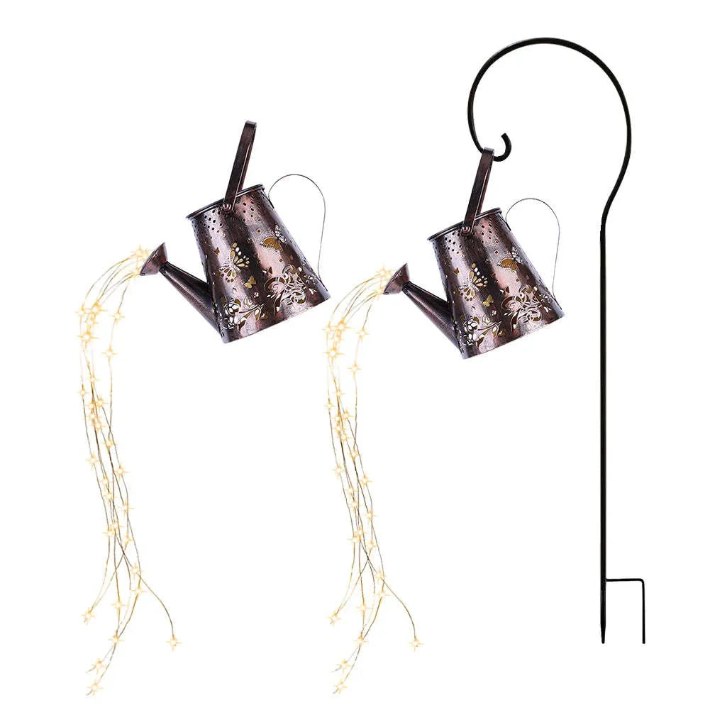 Solar-powered iron garden lamp with a tapered butterfly design and warm white LED light.