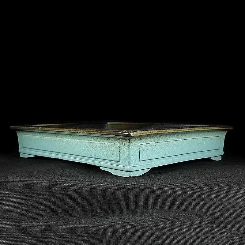 Green handmade ceramic bonsai pot with a retro purple sand crackled glaze finish.