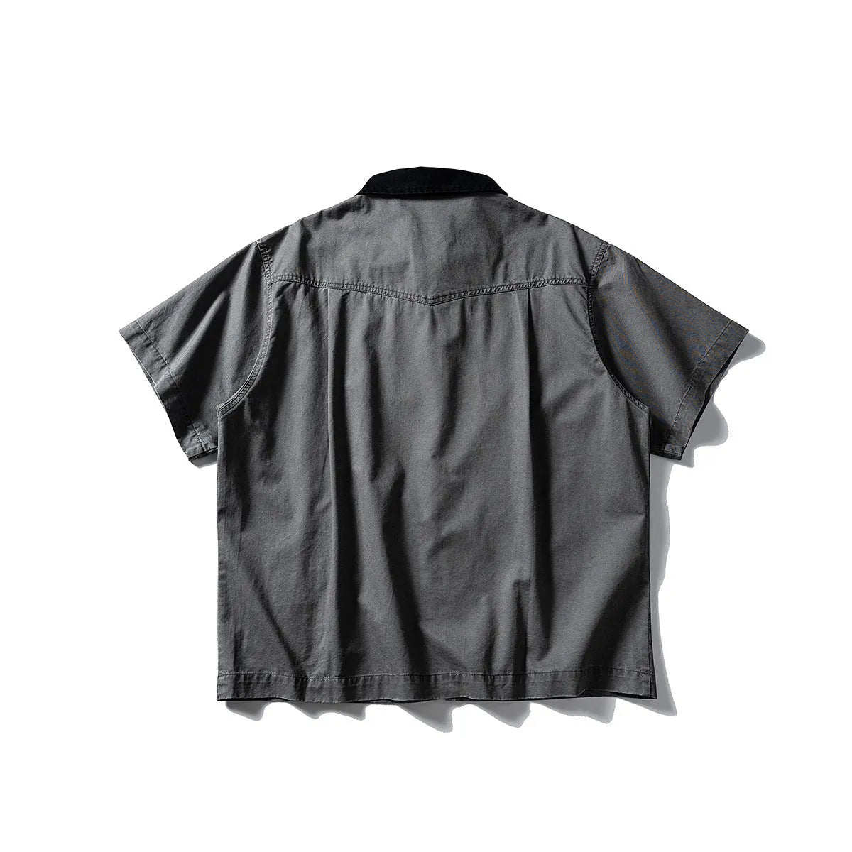 Short sleeve washed overalls shirt in loose cardigan style, shown in khaki colour.