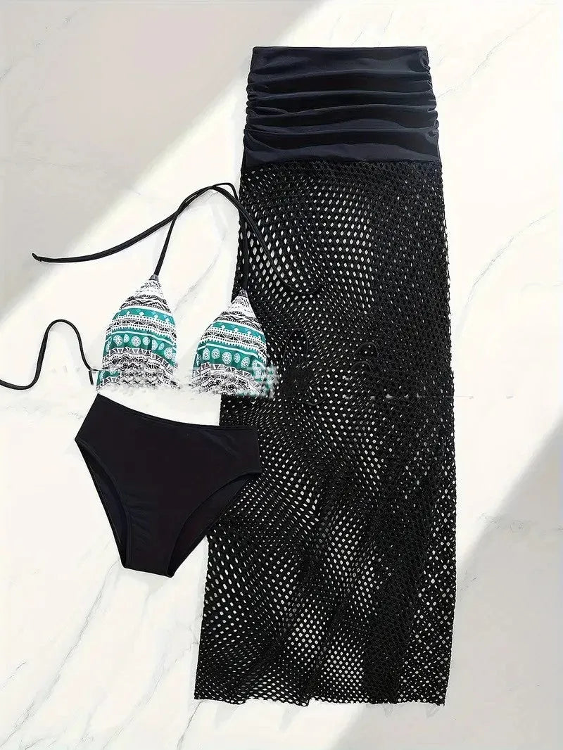 Women's black bikini and fishnet long skirt three-piece swimwear set on a mannequin.