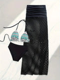 Women's black bikini and fishnet long skirt three-piece swimwear set on a mannequin.