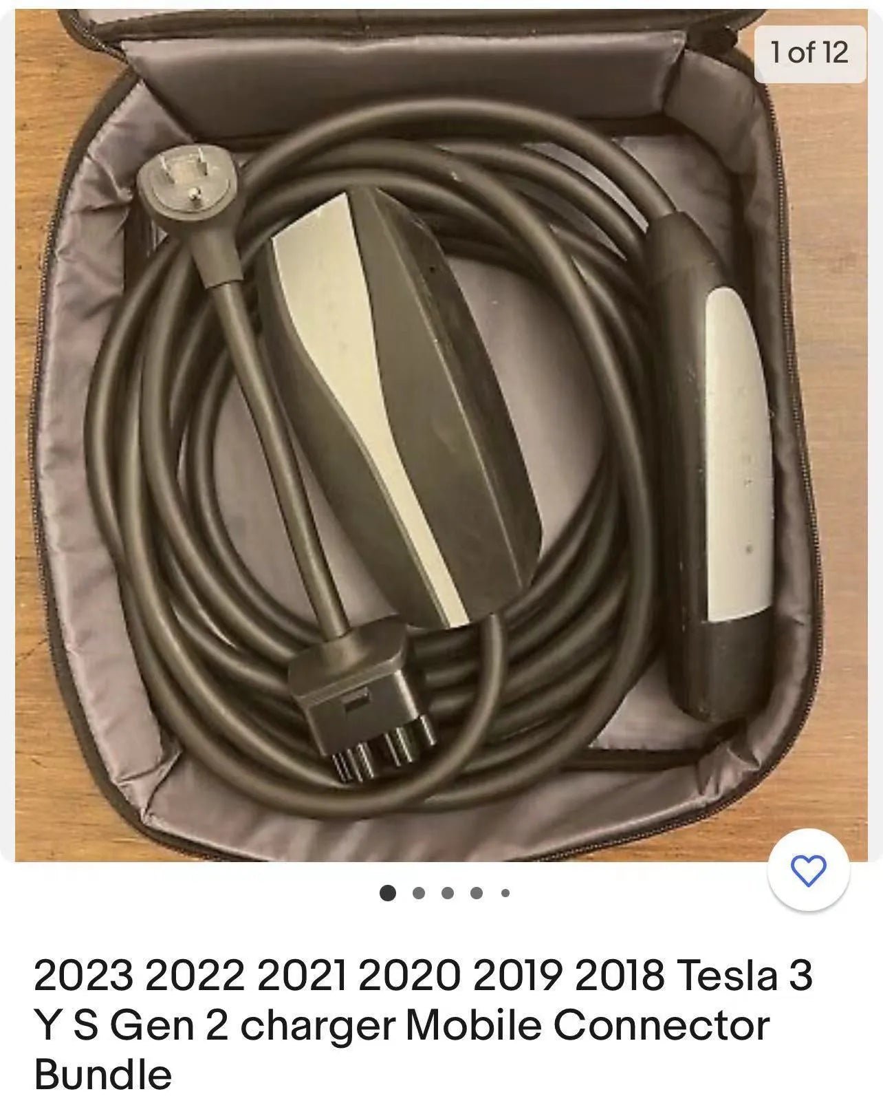 American plug to car charger adapter cable with white sheath on a grey background.