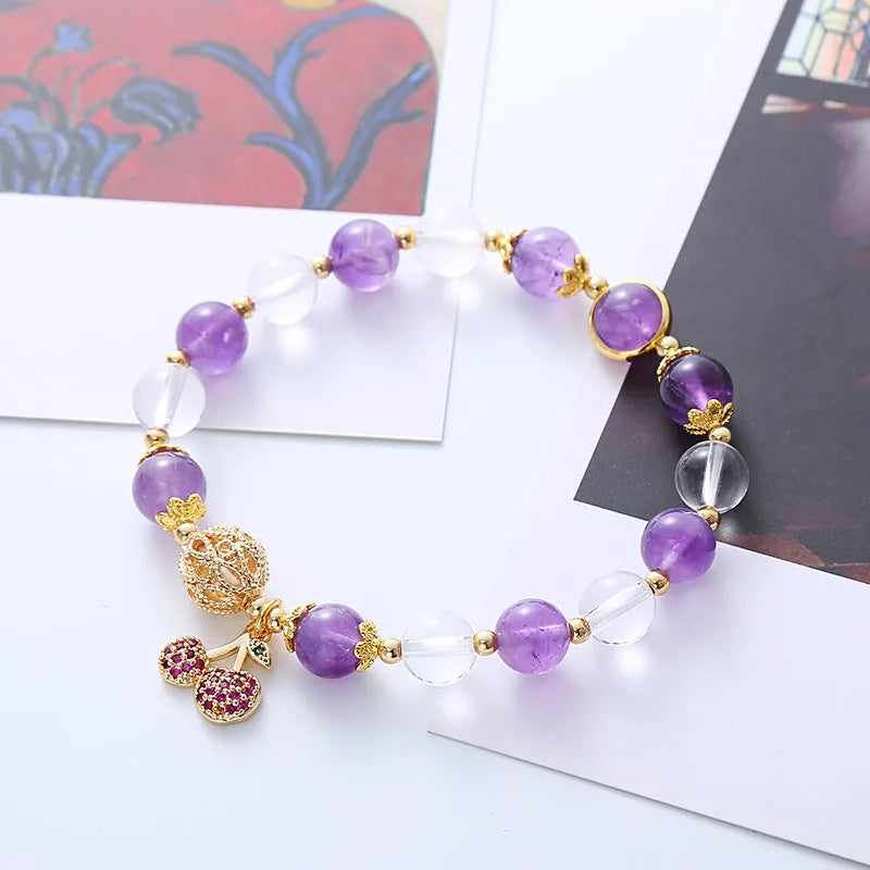 Purple crystal women's bracelet with micro-inlaid cherry blossom design in amethyst colour tones.
