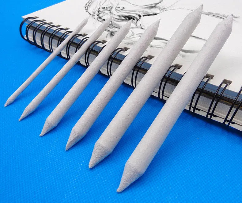 Rice paper eraser pen stick for art sketching and correction on paper, shown on a surface