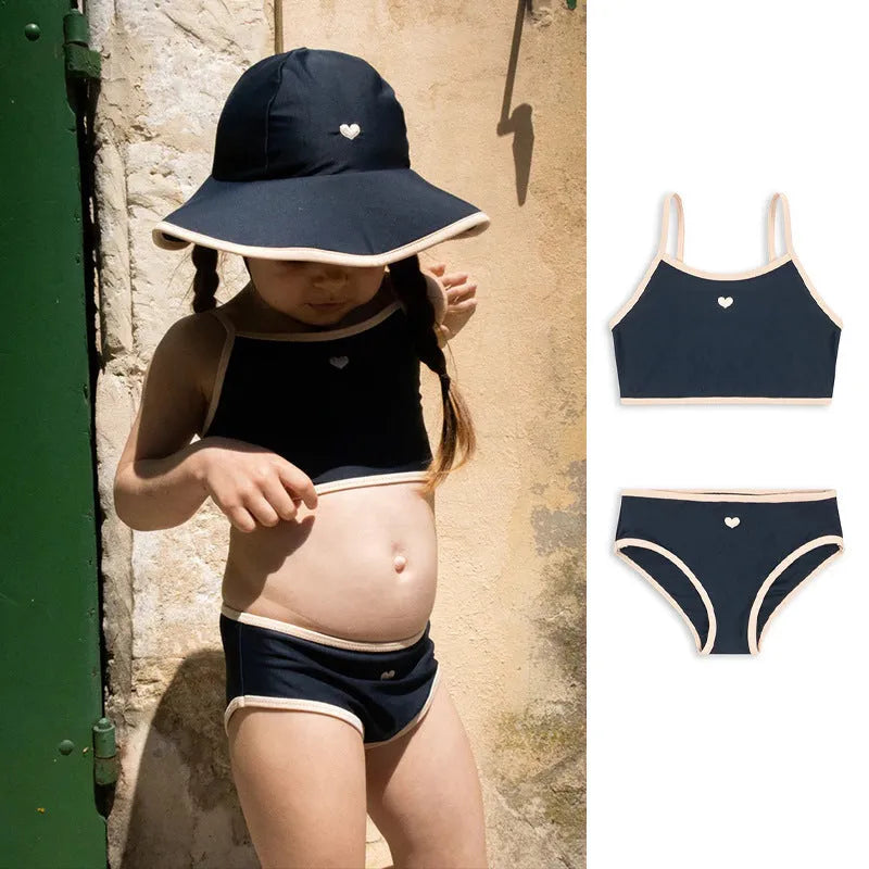Dark blue split colour baby girl's swimsuit with briefs and split design for swimming.