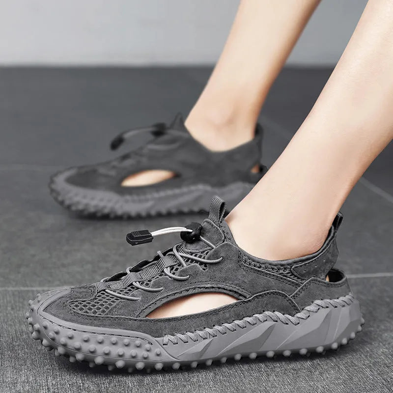Men's waterproof sports sandals with leather mesh uppers, rubber soles, and elastic band closure in black, grey, or khaki