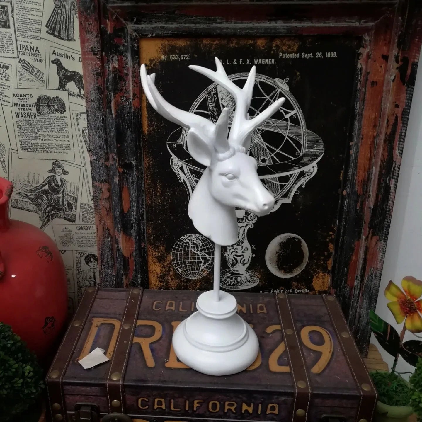 Handmade natural resin animal sculpture decoration in black, white, or wood colour, 32cm tall.