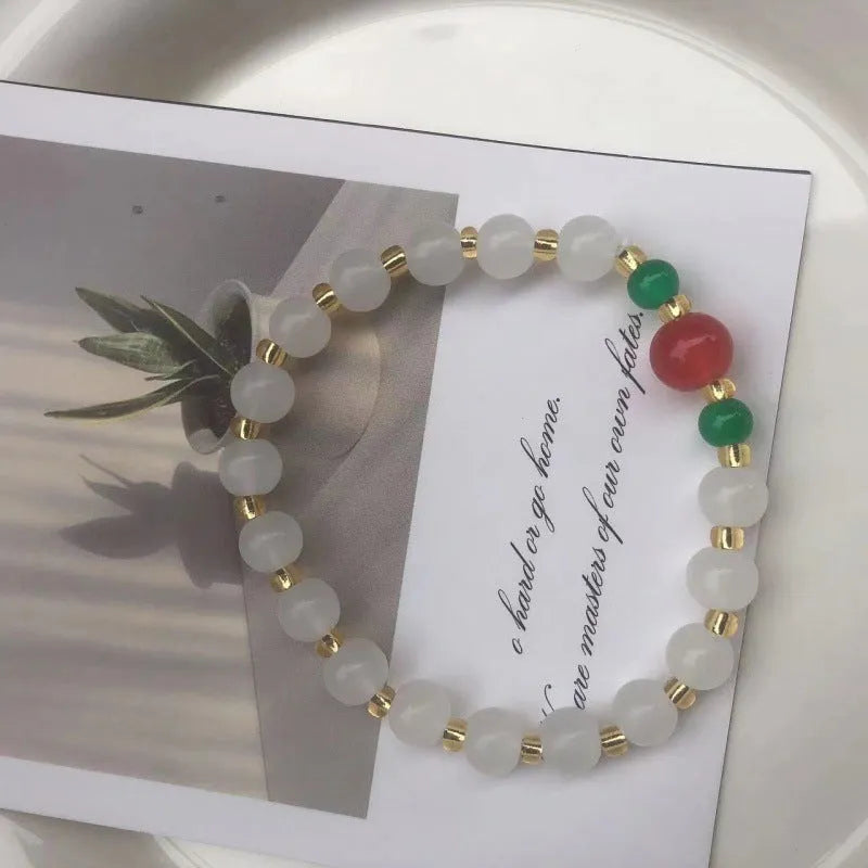 Chinese style glass bracelet with bamboo joint design elements in multiple colour options