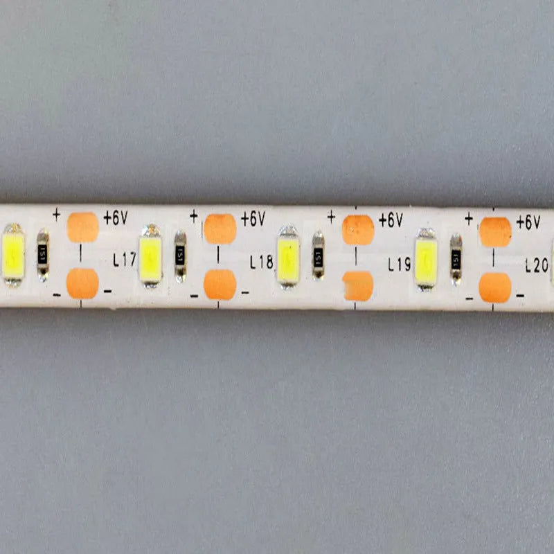 5 metre long flexible USB LED light strip showing touch control and bright white illumination