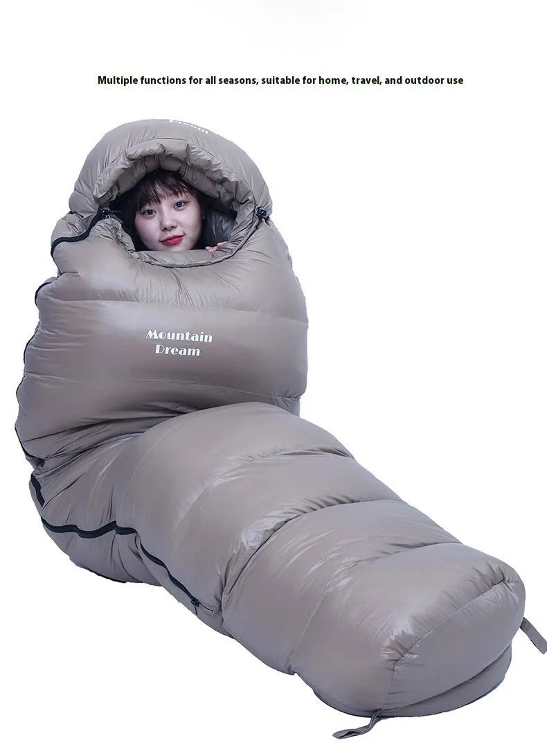 Ultralight mummy sleeping bag in army green colour with white duck down fill.