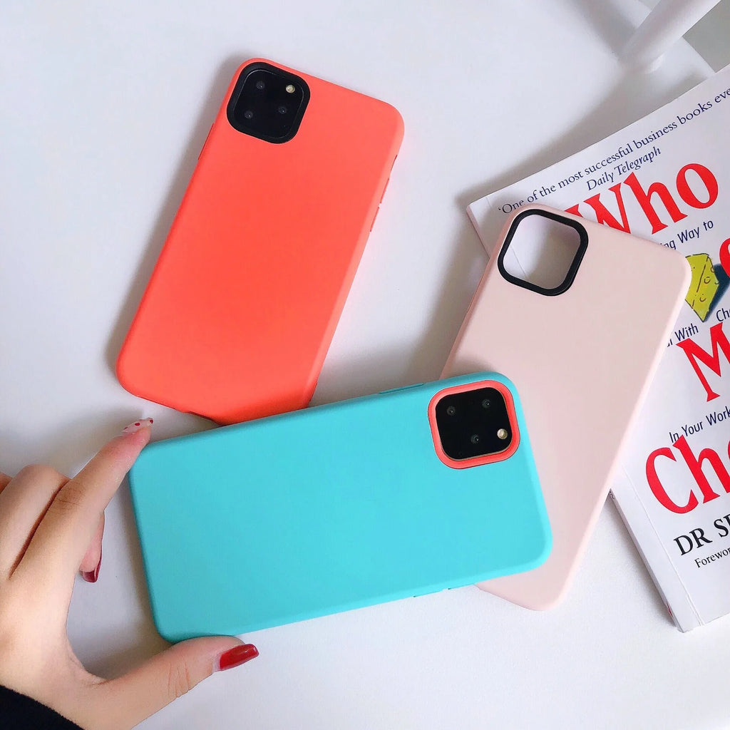 Silicone mobile phone case with macaron cartoon pattern in pink, fitted on an iPhone