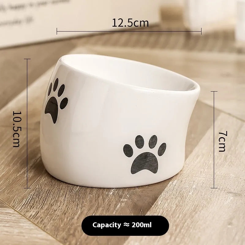 Ceramic cat bowl with high-footed design showing cat's paw decoration pattern in selected colour
