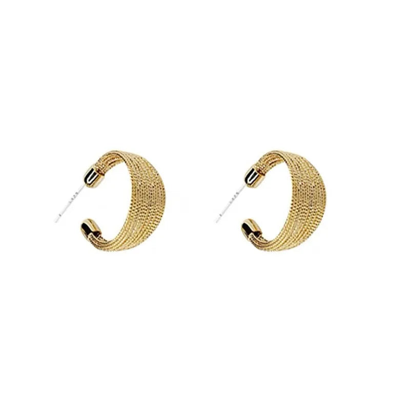 Geometric multi-layer copper earrings with silver or gold electroplated finish, available as studs or clips