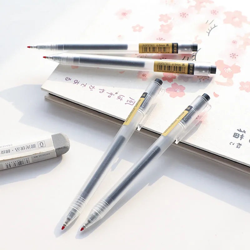 12 black retractable gel pens with frosted barrels and 2 refills on white background