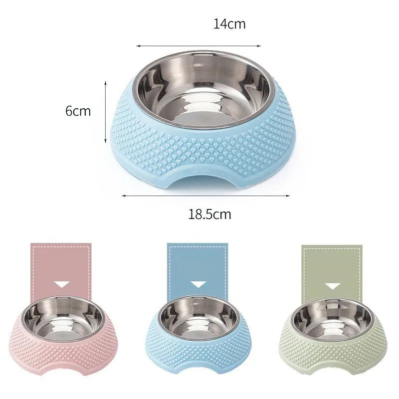 Blue stainless steel pet bowl with a non-slip base for cats and dogs on a floor.