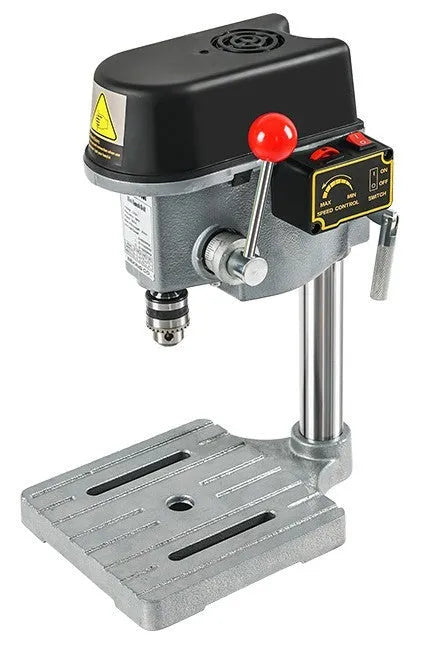 Mini bench drill milling machine on a workbench with optional pliers or drill accessories.