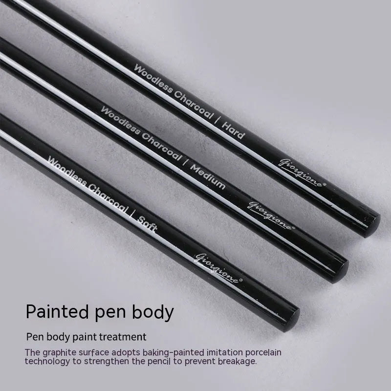 Set of six graphite and three carbonized pencils with wooden casings on a retail suction card.