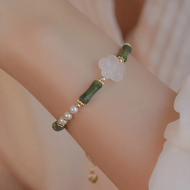 Chinese style olivine bamboo joint shell pearls bracelet with Hetian jade and copper detailing