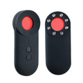 Black portable GPS and hidden camera detector with USB cable on a flat surface.