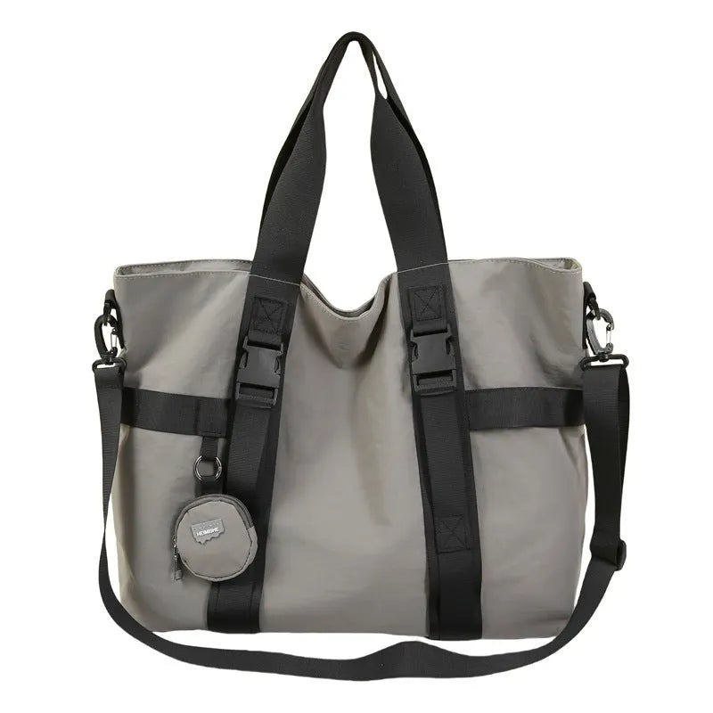 Grey Oxford cloth men's travel shoulder bag with separate coin purse showing large capacity design