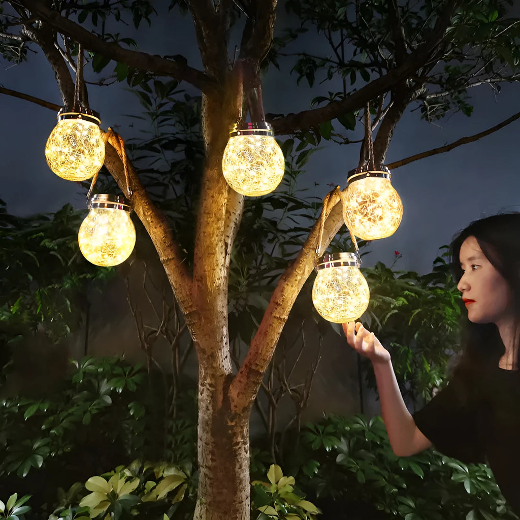 Solar hanging garden light with IP65 waterproof rating and toughened glass body for balcony or yard