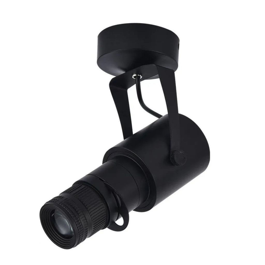 Black surface-mounted LED spotlight with aluminium shell for commercial restaurant lighting.