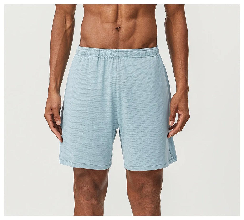 Men's sky green double-layer running shorts with mid waist and shorts length on a plain background.