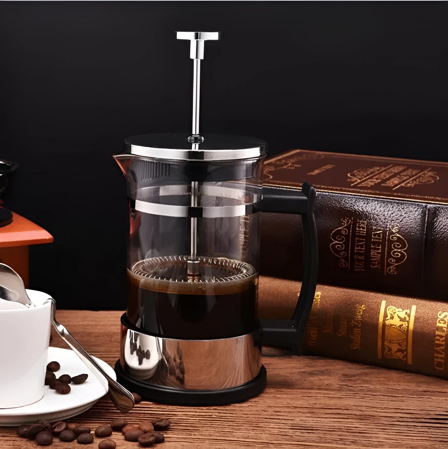 Glass and stainless steel manual coffee maker with 350ml capacity measuring 10cm wide by 8cm deep by 17cm tall