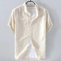Men's loose fit short sleeve shirt in a cotton linen blend, shown in a solid colour.