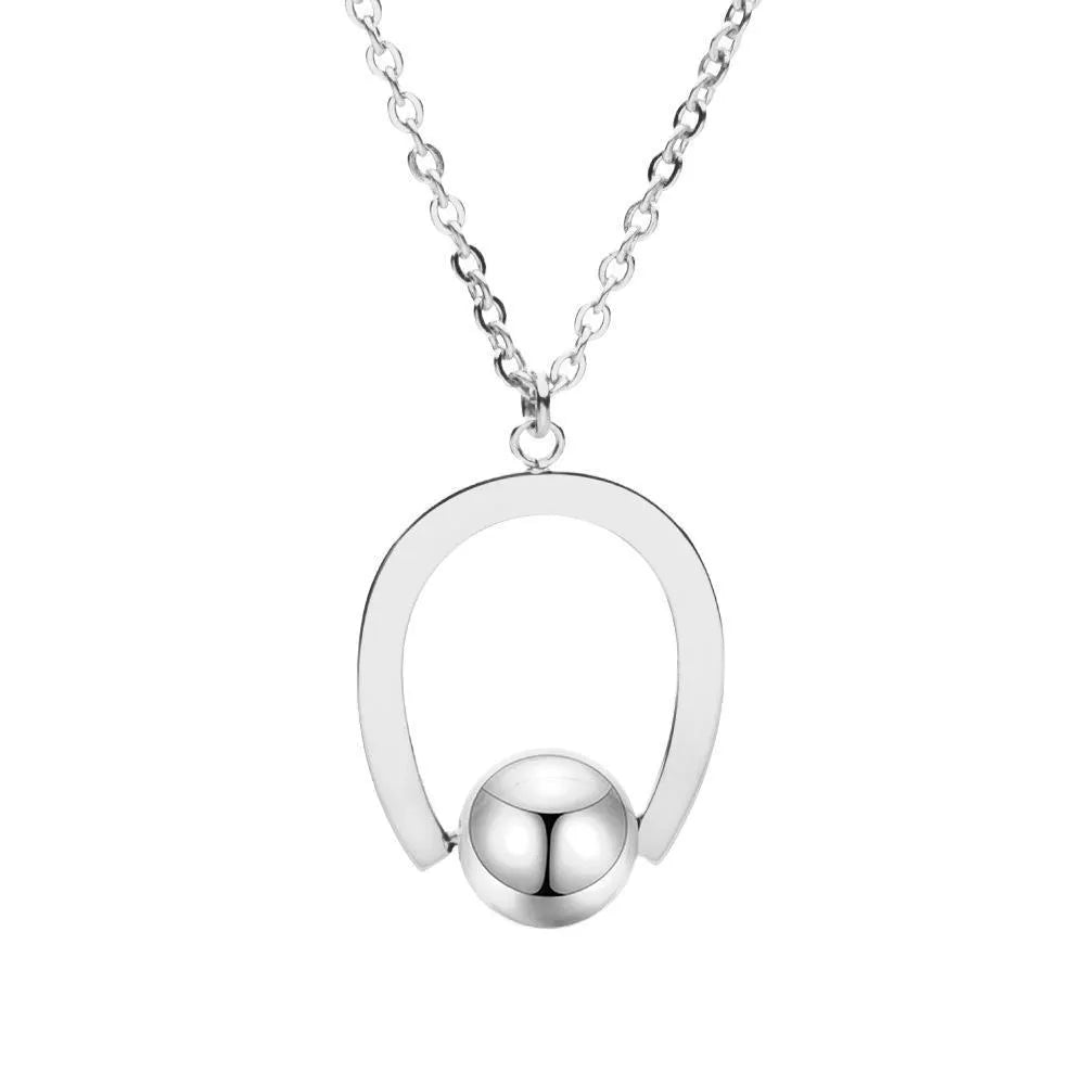 Gold or silver adjustable stainless steel necklace with a geometric pendant on a cross chain.