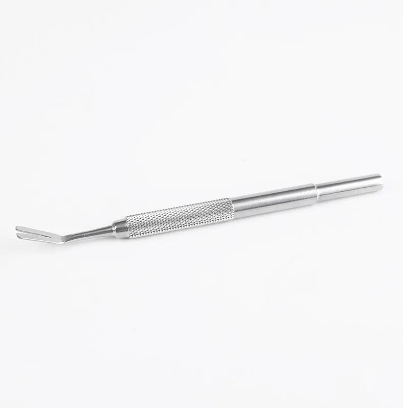 Close-up of stainless steel tick removal tweezers with fine tip and ergonomic handle for pets.