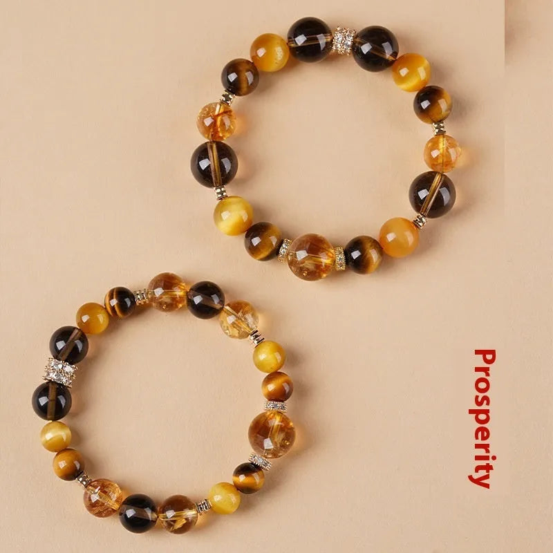 Crystal tiger-eye bracelet with yellow tower design showing 10mm geometric beads