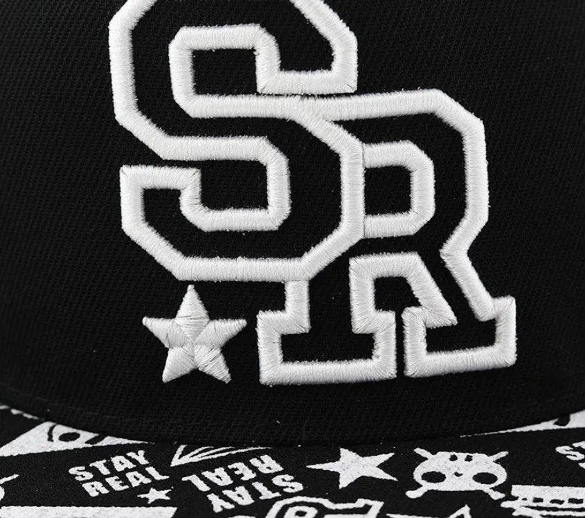 Adjustable black cotton baseball cap with embroidered lettering on the front, showing dome crown shape.