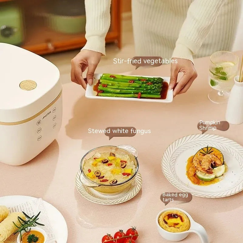White 3L rice cooker with black inner pot and included accessories