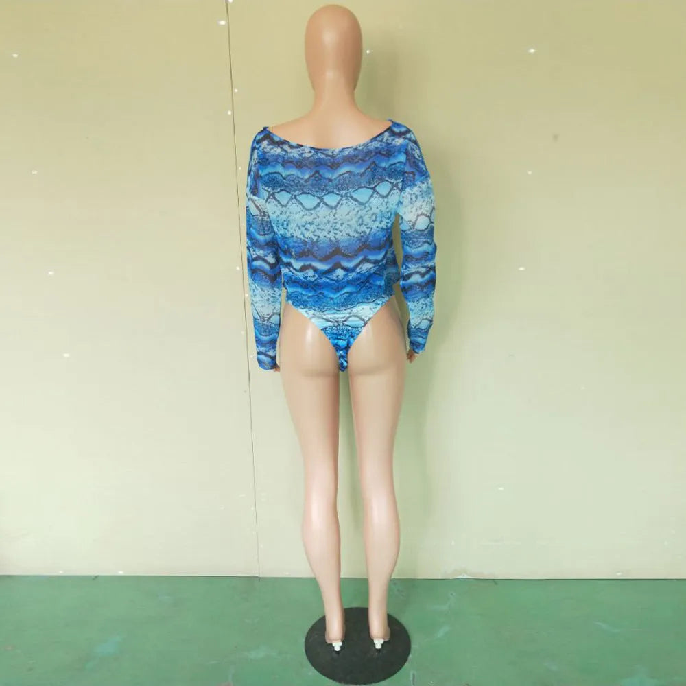 Women's snakeskin print polyester bikini set with long sleeves and shorts in purple, blue or green