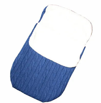 Envelope-style baby stroller sleeping bag in beige colour with thick filling, shown next to a pram.