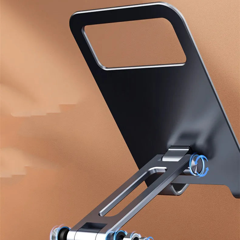 Folding aluminium alloy mobile phone stand in silver on a desktop showing rotary orientation