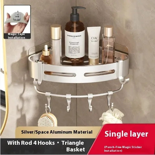 Gun gray punch-free mounted corner bathroom storage rack with towel rod on a white tile wall.