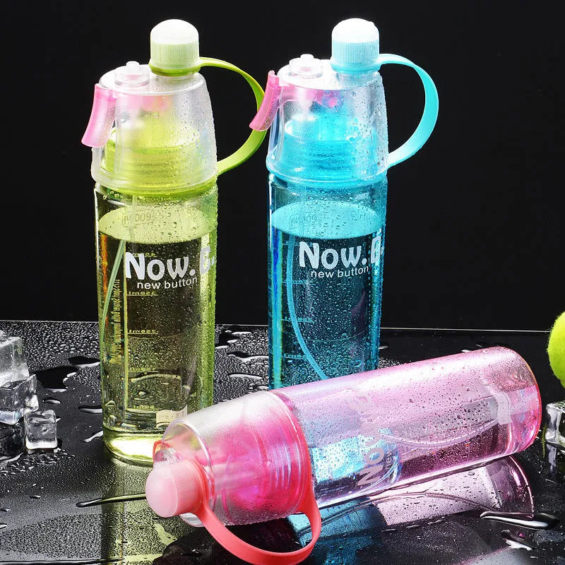 Portable green outdoor mist spray cup with handle, scale, and leakproof pad.