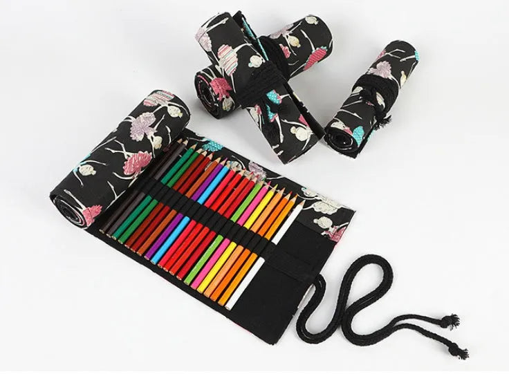 Canvas square rolling pencil case with ballet girl printing showing multiple colour pencils organised in slots
