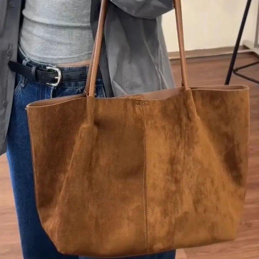 Large capacity PU tote bag in coffee colour with double joint shoulder straps, three-dimensional outer pocket, and document bag, horizontal square retro commuter style.