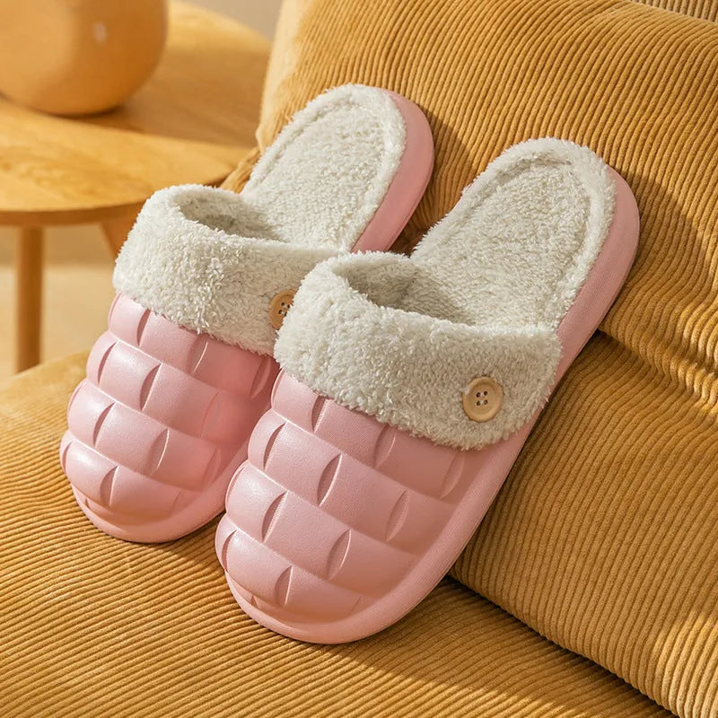 Plaid detachable EVA slippers with plush lining in pink, shown on a foot.